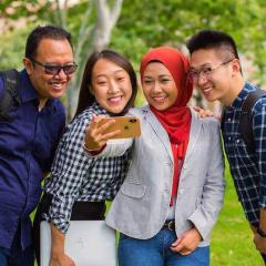 Four students taking a selfie